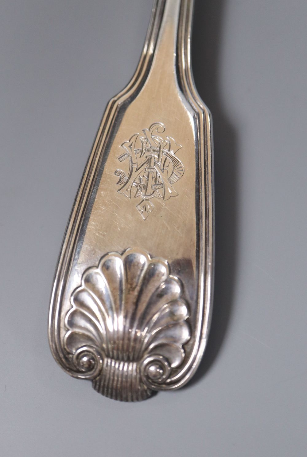 A late William IV silver fiddle, thread and shell pattern fish slice, Mary Chawner, London 1836, 32.5cm, 7.5oz.